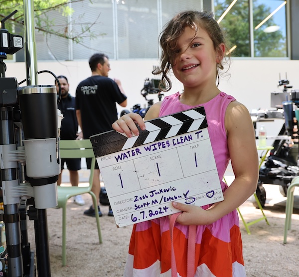 Young Girl Holds a Sync Slate for a Houston Based Video Production