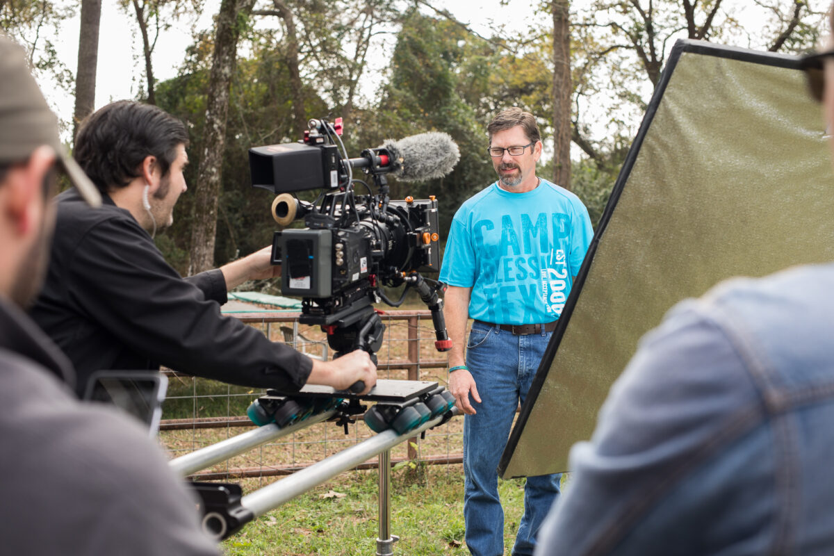 Behind the scenes photo from promotional video by Cut To Create Corporate Video Production based in Houston, Texas for Herobed and Camp Blessing.