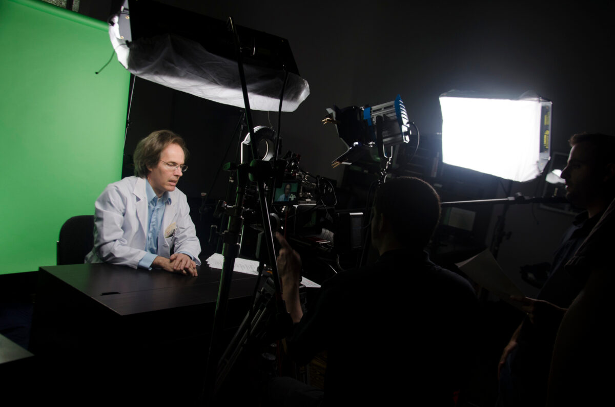 Behind the scenes on Cut To Create's video production shoot for Virtuix utilizing a green screen