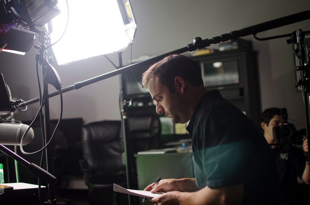 Behind the scenes on Cut To Create's video production shoot for Virtuix utilizing a green screen