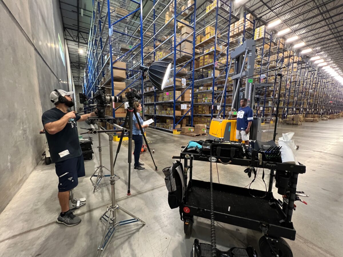 Behind the scenes at Cut to Create's video production shoot for Mitsubishi Logisnext featuring the Dallas Cowboys and how they use Jungheinrich and Cat Lift Trucks.