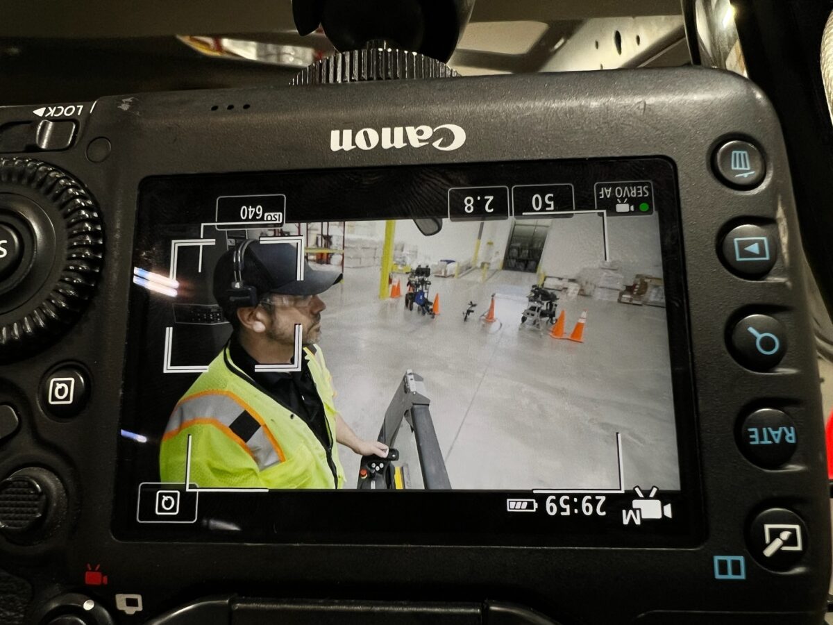 Behind the scenes for a video production shoot for Mitsubishi Logisnext featuring their Jungheinrich Turret Truck