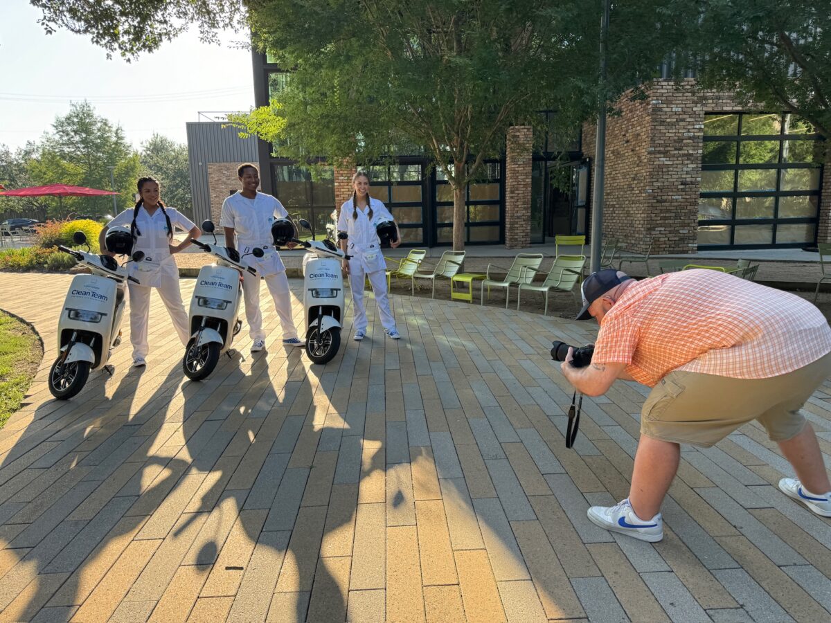 Photographer, Troy Fields, getting some stills with the WaterWipes Clean Team