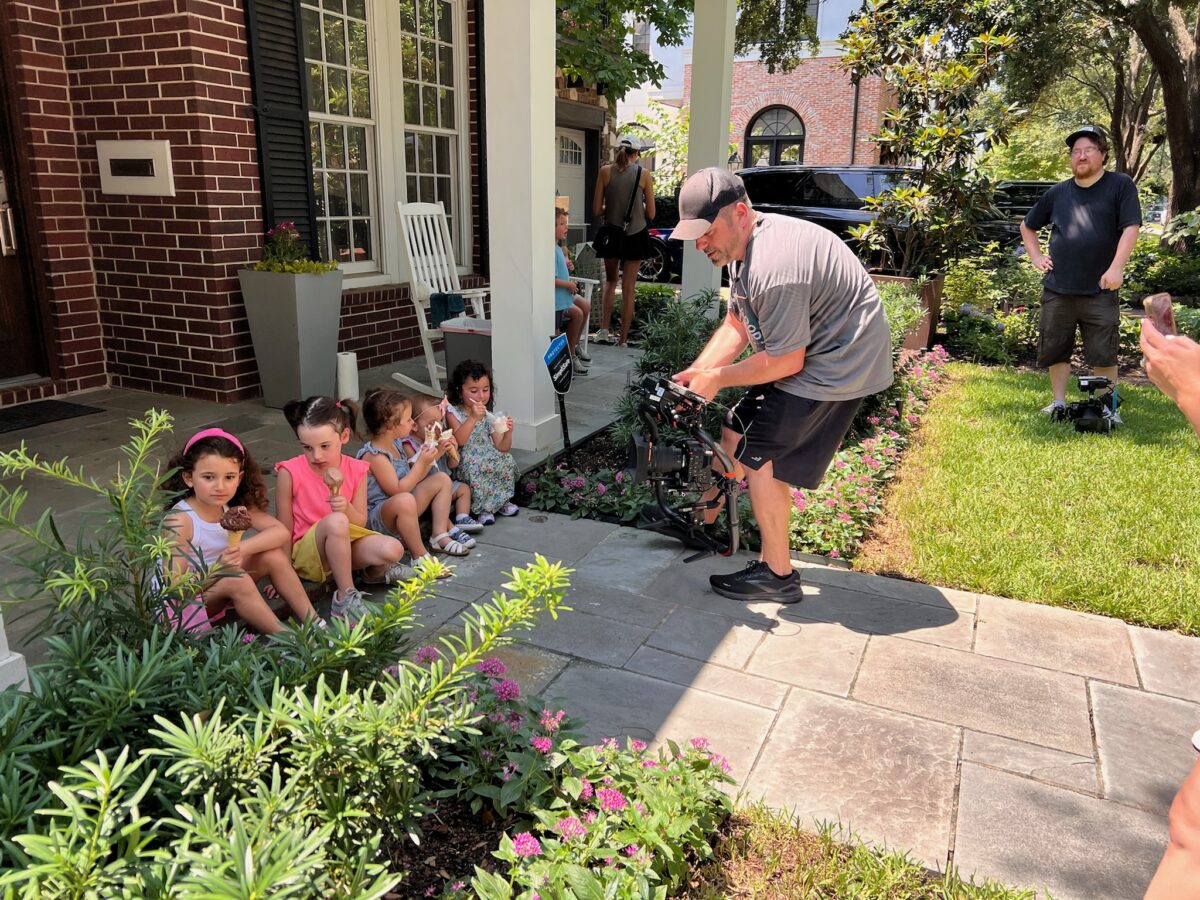 Scott Marett filming little girls eating ice cream