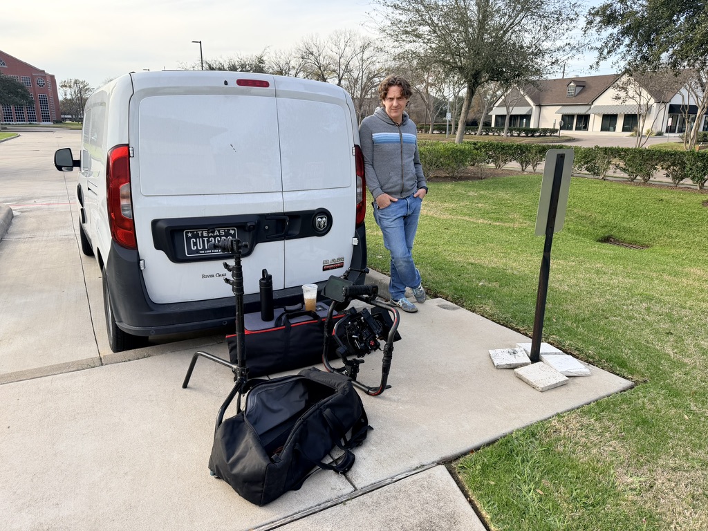 Cut To Create director reviewing footage on set for Exectras video production