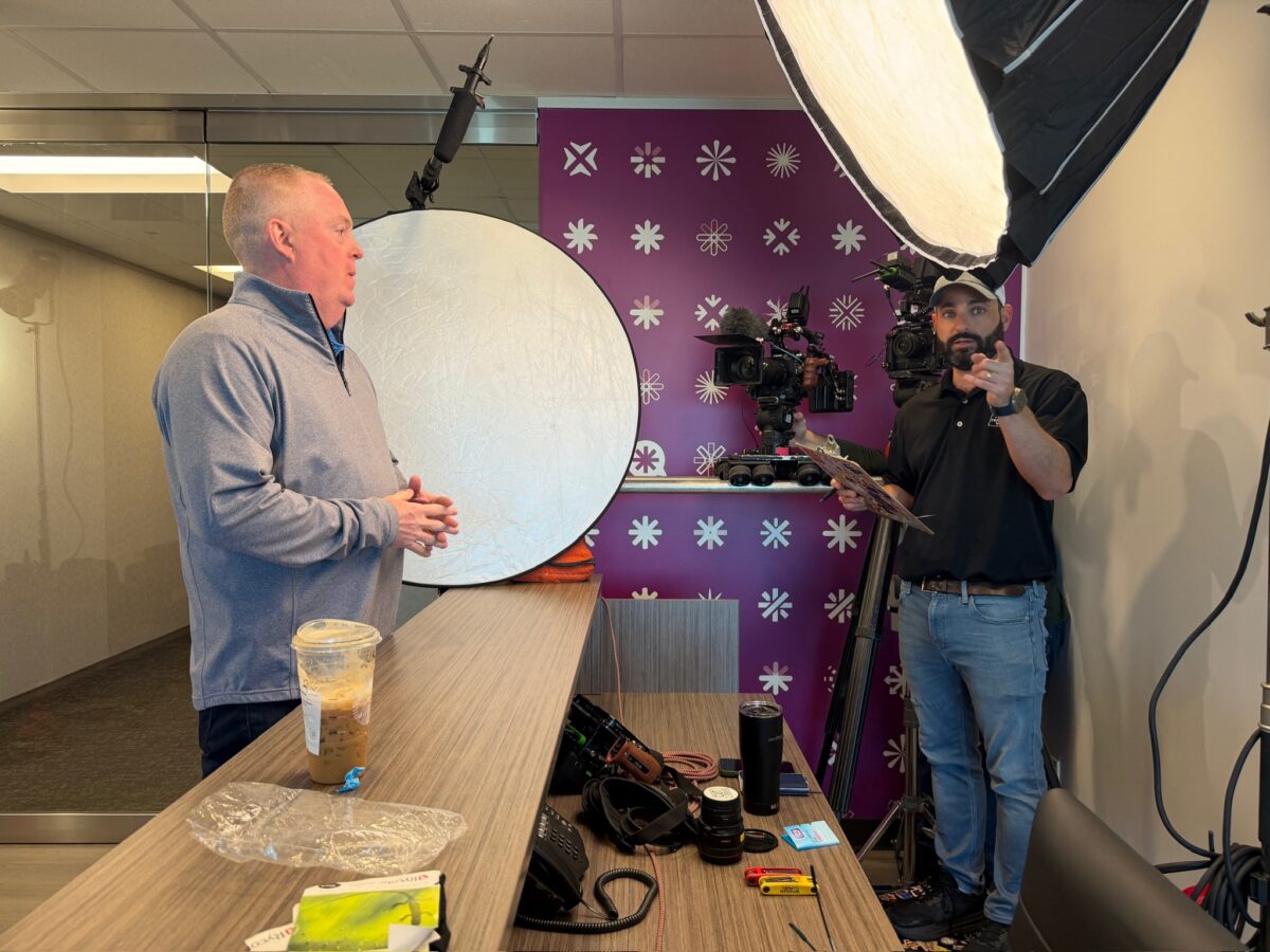 Professional interview setup featuring Exectras leadership on camera